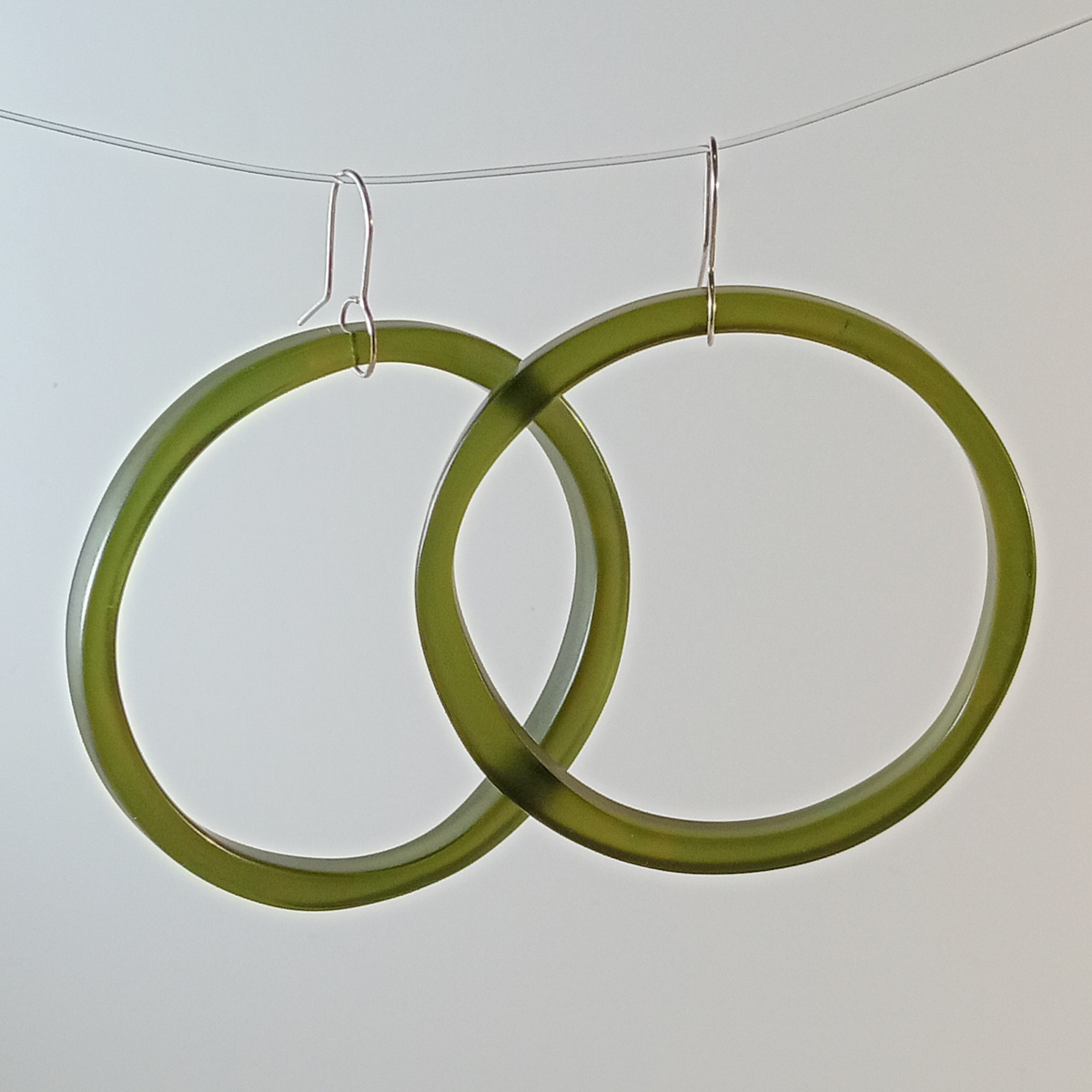 Extra Large Hoop Earrings shown illuminated with light