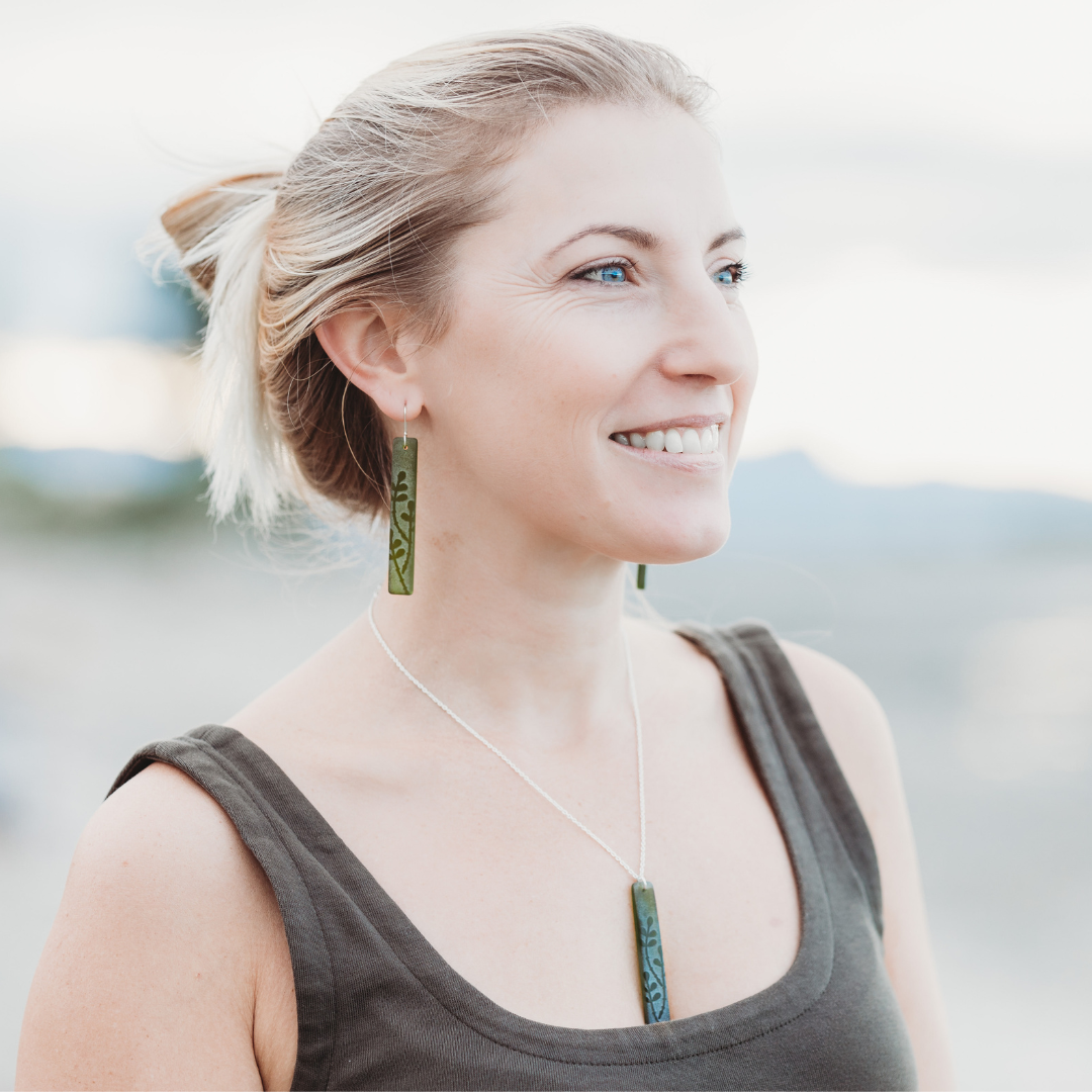 Green Rātā Vine Drop Earrings and Pendant on model