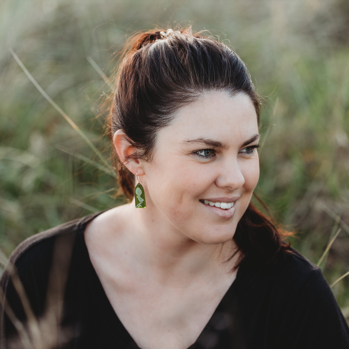 Glass Fantail Earrings Green worn on model