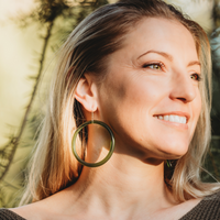 Large Hoop Earrings Green worn on model