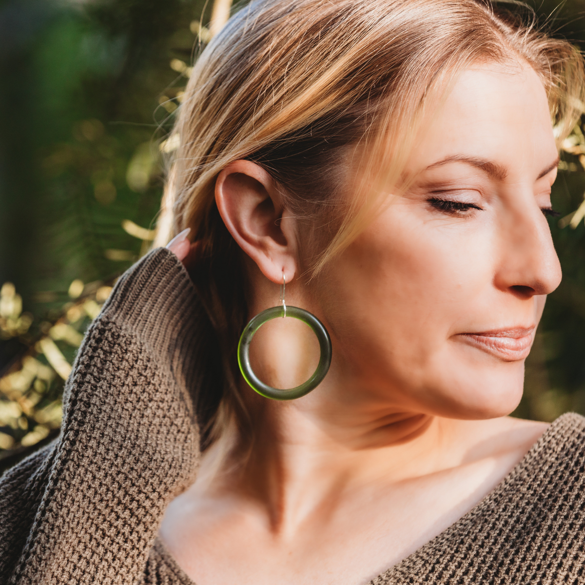 Medium Hoop Earrings Green worn on model
