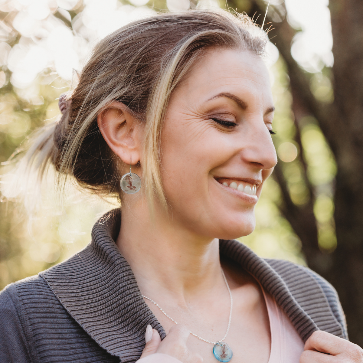 Glass Fantail Disc Earrings and Small Pendant Light Blue  worn on model