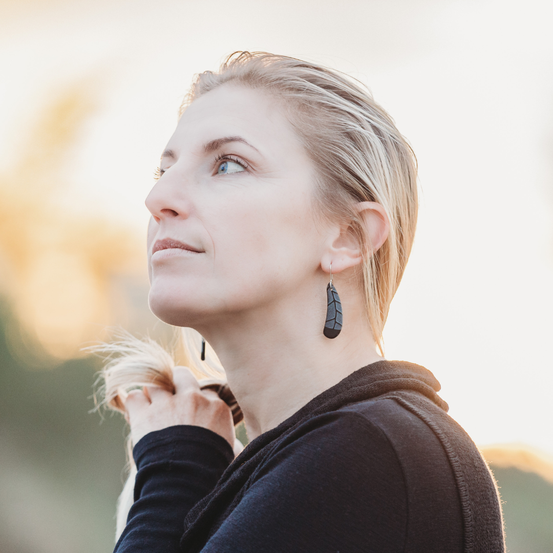 Huia Feather Earrings Black worn on model