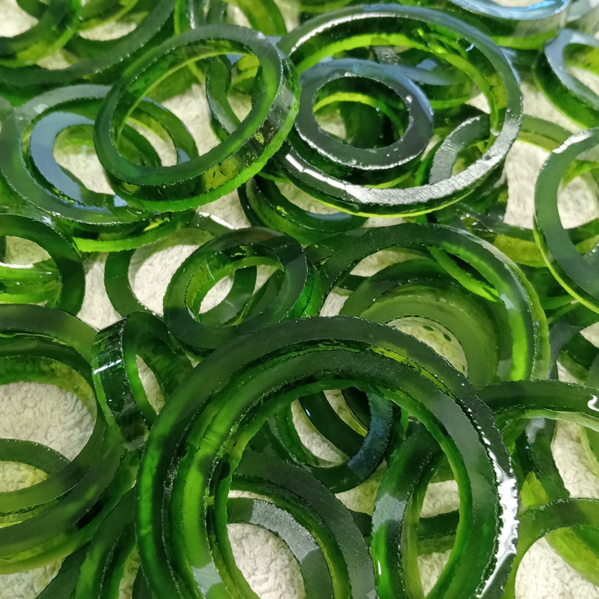 Sliced up-cycled bottle hoops 