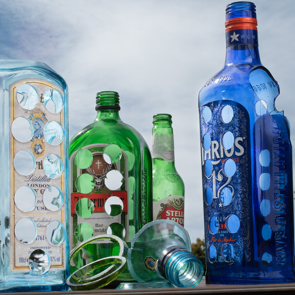 Bottles with disc holes drilled