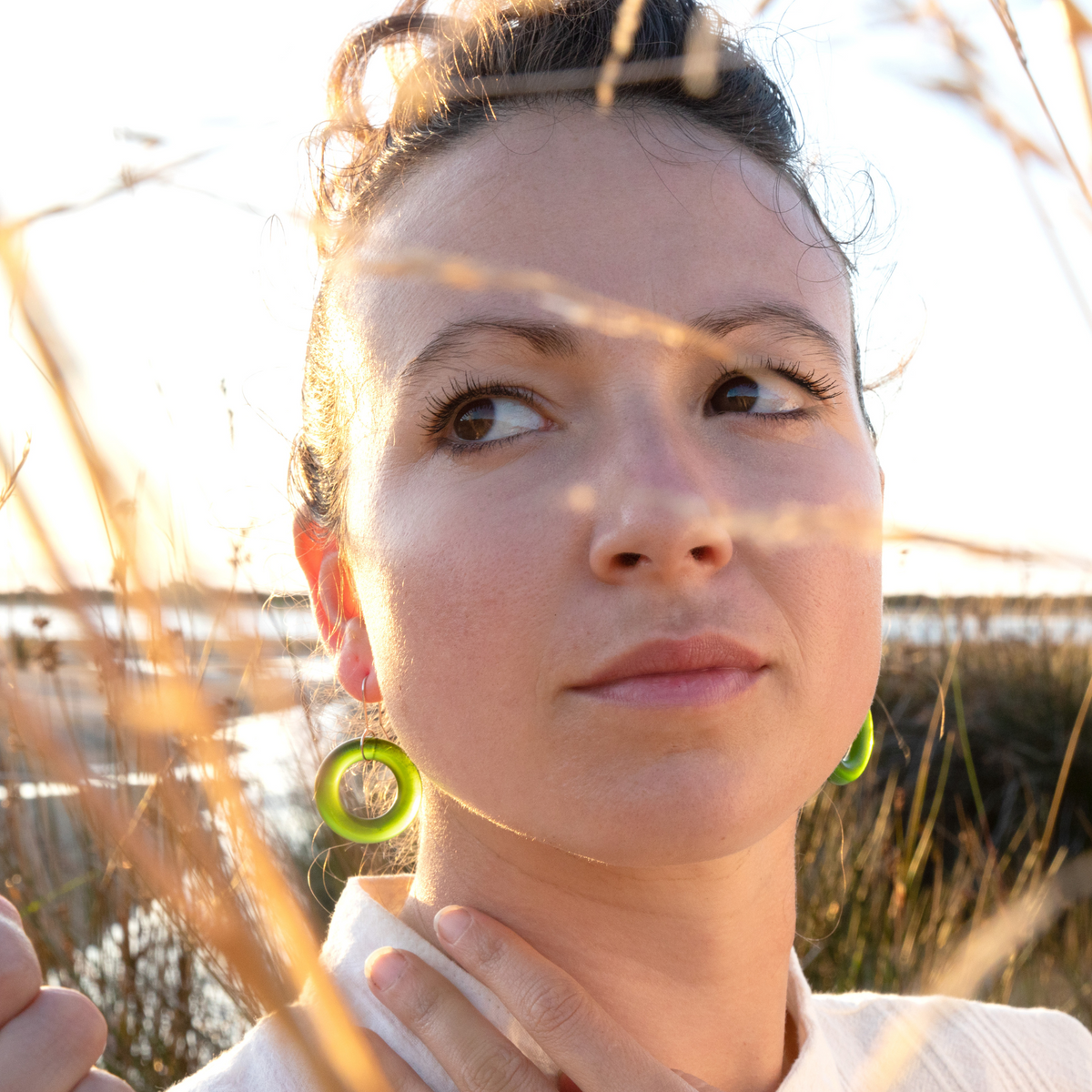Small Hoop Earrings Green worn on model