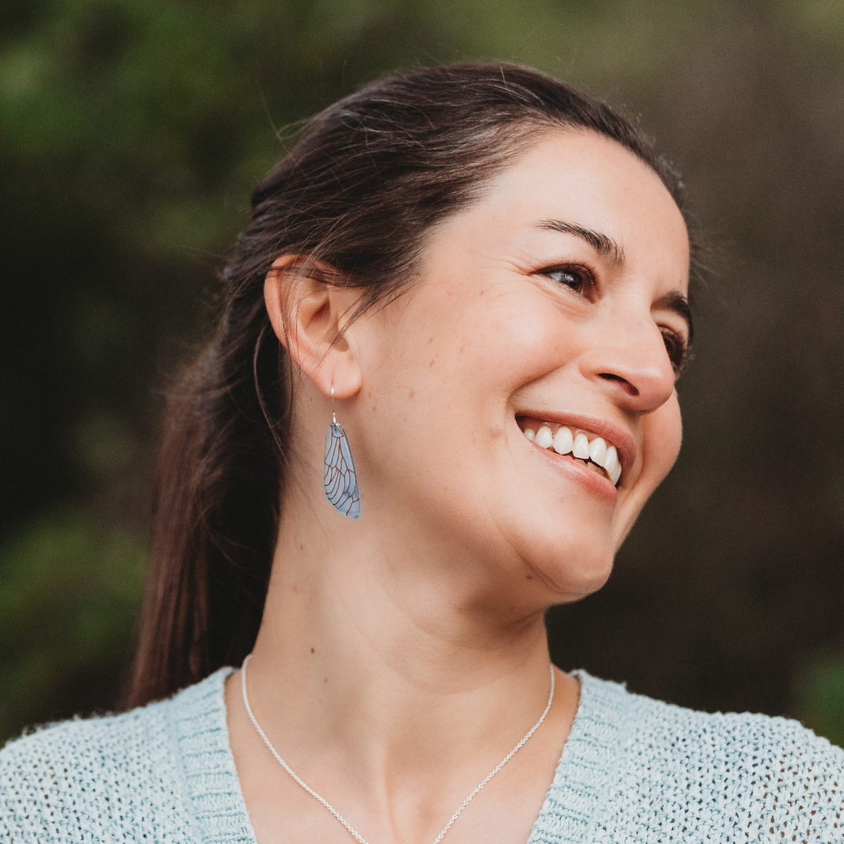Dragonfly Wing Earrings Light Blue worn on model