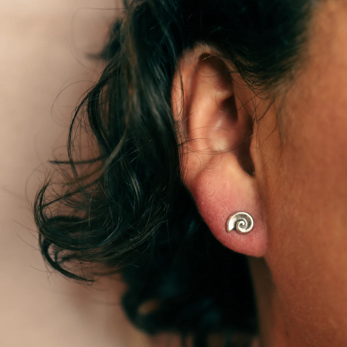 Koru Studs Silver worn on model