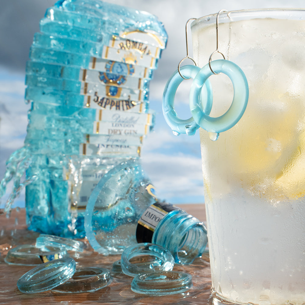 Bombay Sapphire bottle with Small Hoop Earrings
