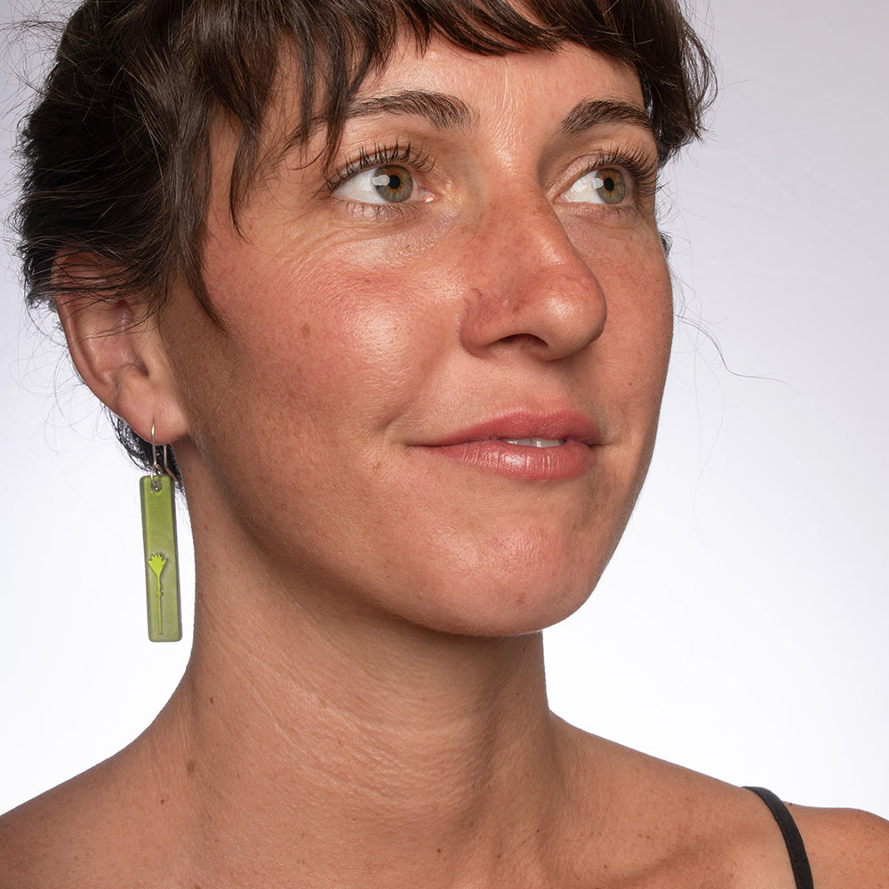 Nīkau Drop Earrings Green on  model